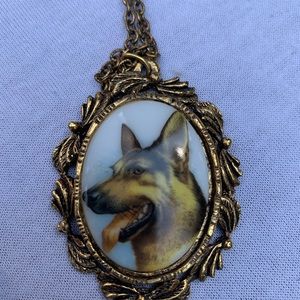 Beautiful necklace with German Shepard on one side mirror on back